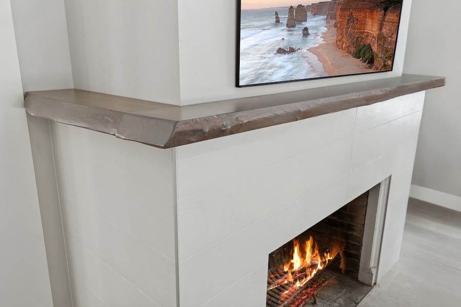 wood mantle around fireplace